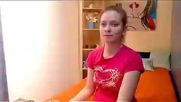 Young school girl teen undressed, and sticks her finger in pussy