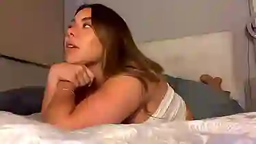 Brunette amateur gets naked on webcam and rubs her pussy to orgasm